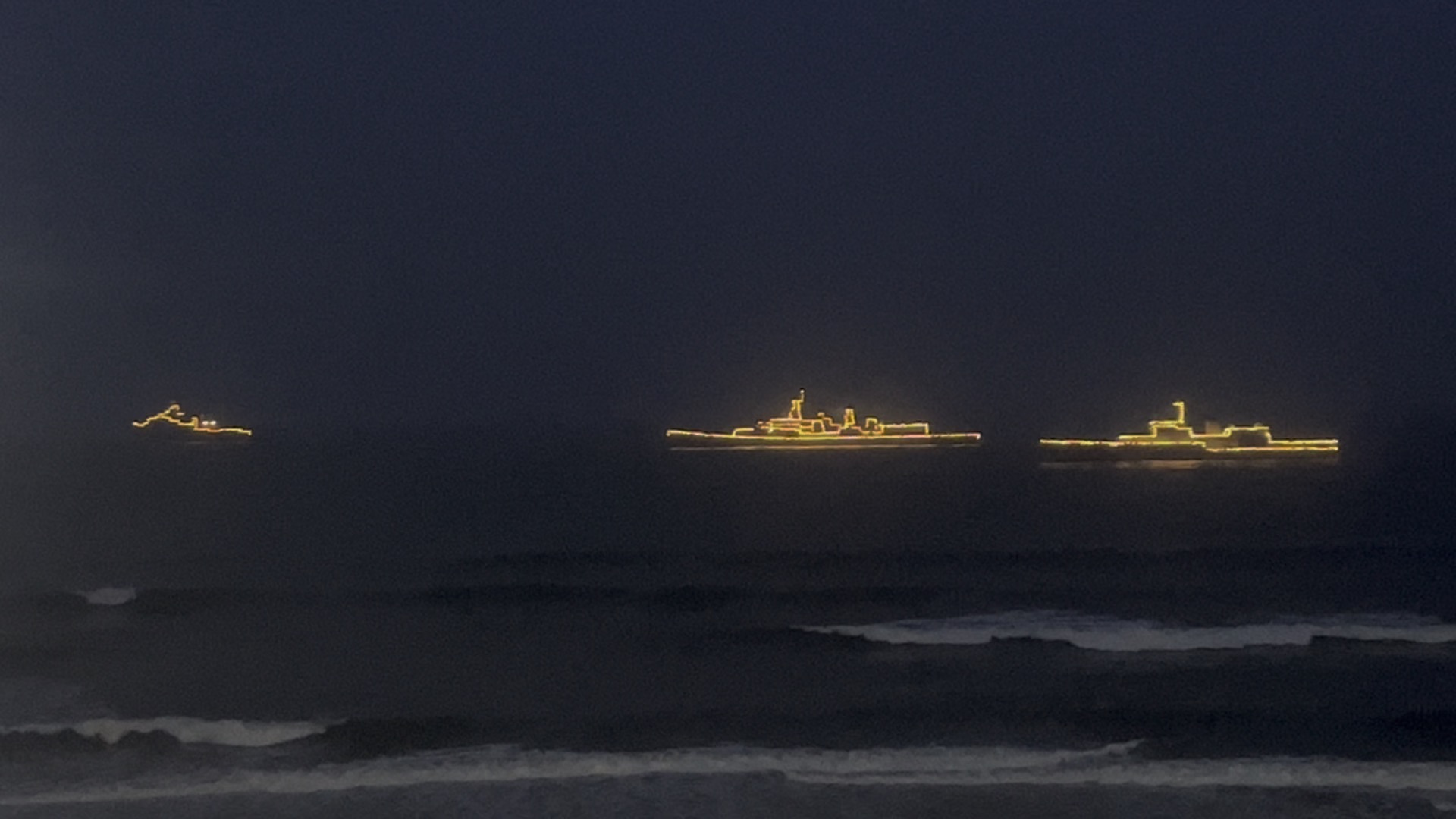 Illuminated warships Bay of Bengal